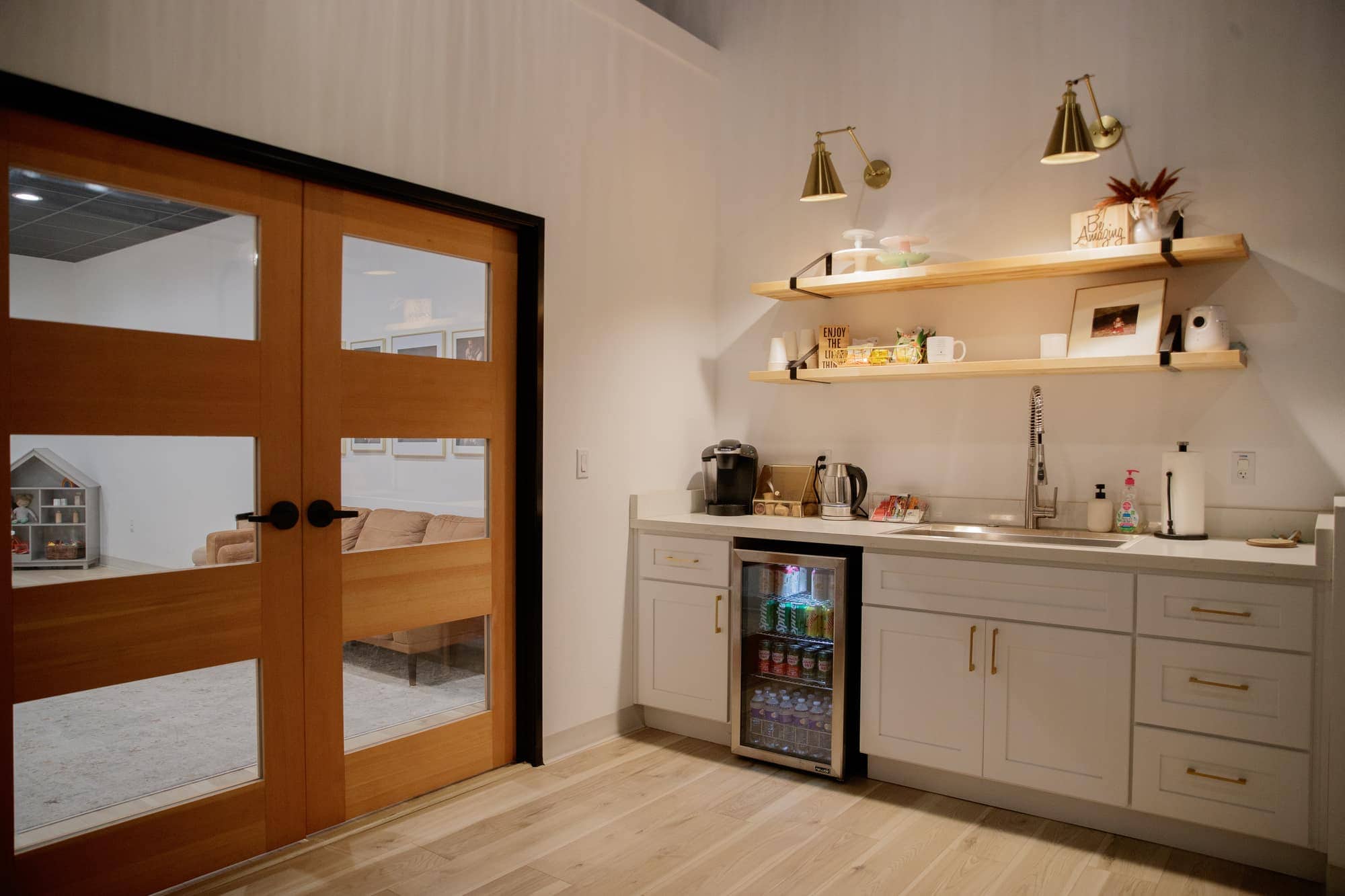The private kitchenette at Jesica Allen's Lodi photography studio, stocked with drinks and snacks