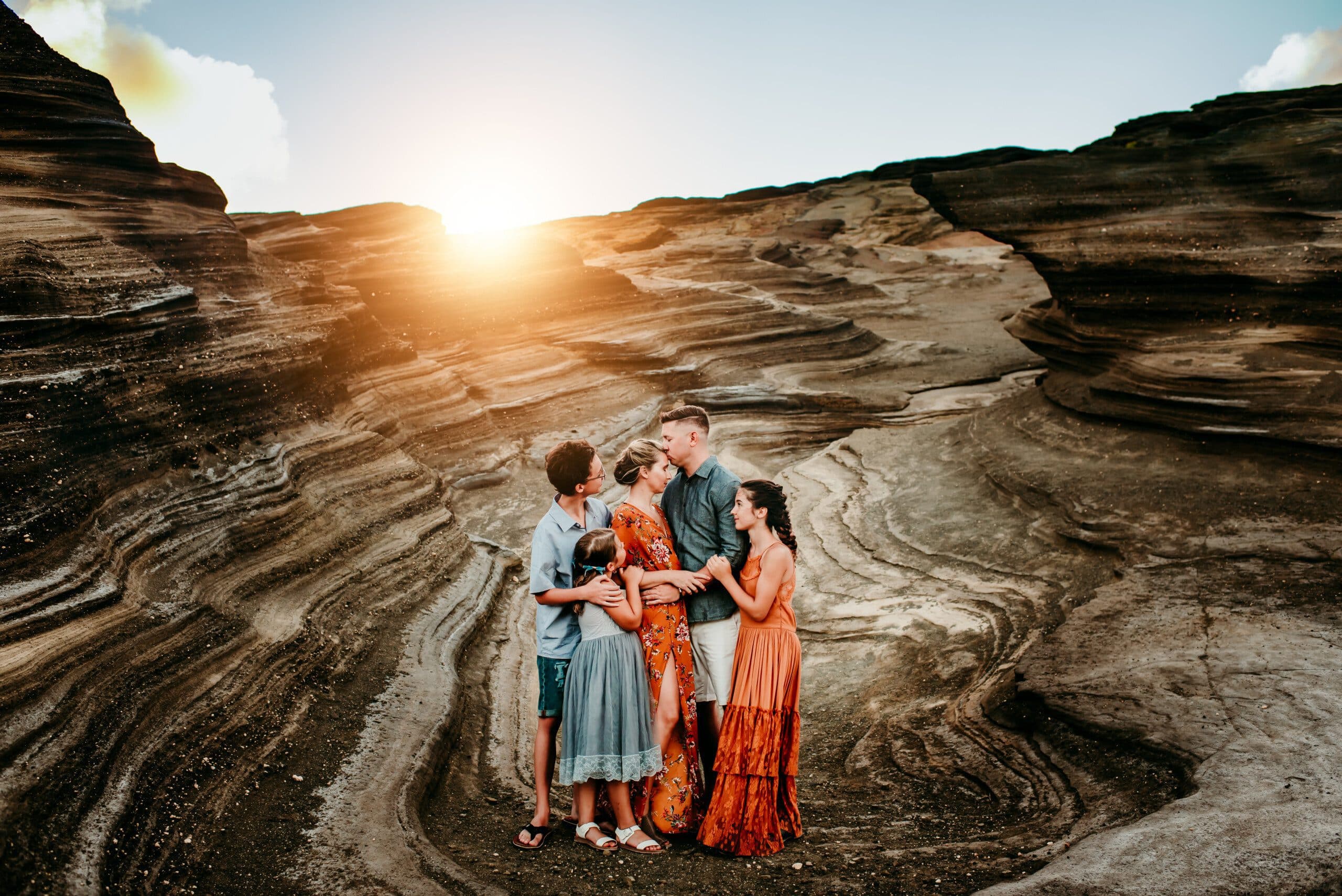 Jesica Allen with her husband and three children outdoors at sunset